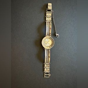 Silpada retired round hammered sterling silver watch with filigree band.